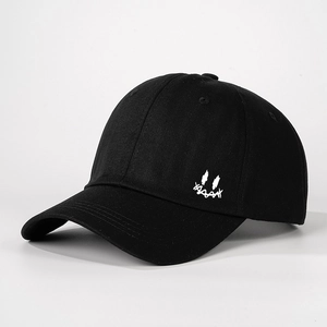 Classic black cotton baseball cap featuring a white graffiti smiley face embroidery