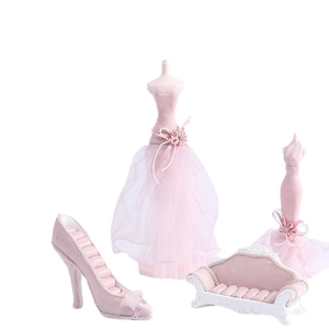Pink velvet jewelry display set with mannequin stands, shoe ring holder, and sofa box