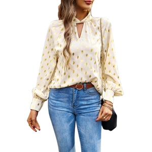 Beige puff sleeve blouse with gold polka dots and neckline cutout for professional women