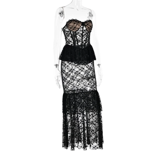 Detail of black lace mermaid dress with corset bodice and ruffled hemline
