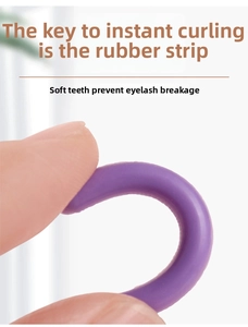 Close-up of flexible purple silicone eyelash curler refill pads showing high elasticity
