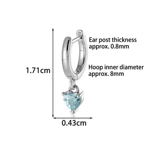 Elegant heart pendant hoop earrings with light blue gemstone and silver finish