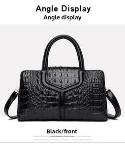 Front view of black crocodile pattern tote bag with polished finish and Y-shaped detail