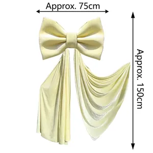 Macro detail of a large velvet bow decoration showing 75cm width and 150cm length
