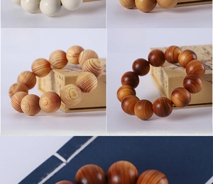 Detailed macro view of 20mm aromatic green sandalwood beads with natural wood grain texture