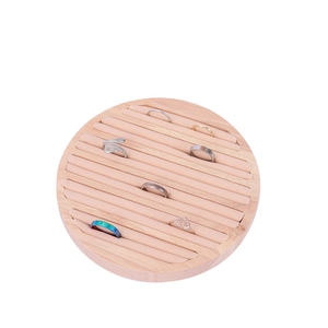 Solid wood circular ring display stand with premium pink velvet lining for jewelry storage