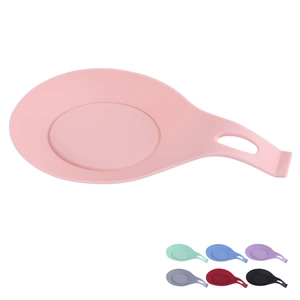 Pink food-grade silicone spoon rest with six color options for kitchen utensil storage