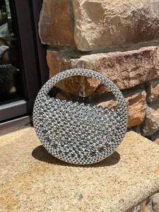 Silver beaded half-moon handbag with metallic beads and hand-woven design for women