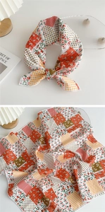 Detail of patchwork square scarf featuring floral, plaid, and polka dot prints on soft fabric