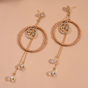 Bohemian woven rattan hoop earrings with gold moon stars and crystal drop tassels