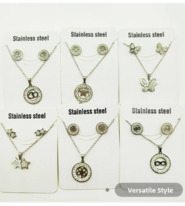 Detailed grid view of silver stainless steel jewelry sets with star and heart motifs