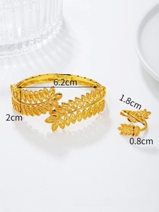 Detail view of gold-plated olive leaf bracelet and ring set with precise measurements
