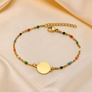 Gold stainless steel bracelet with colorful beads and a round engraved charm for women