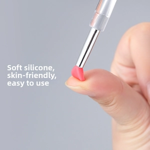 Close-up of soft silicone lip brush head showing high elasticity and flexibility