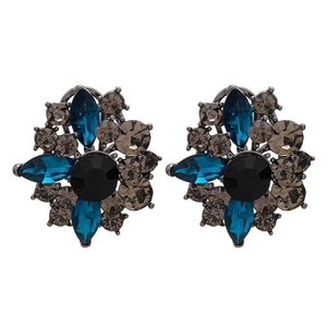 Vintage floral stud earrings with blue and black gemstones in dark metal setting