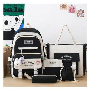 Close-up of a 5-piece student bag set including backpack and totes in black and beige