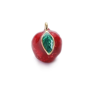 Detailed view of red strawberry charm with gold leaf and enamel coating for DIY jewelry