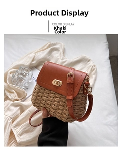 Detail of khaki straw crossbody bag with brown leather flap and golden twist lock