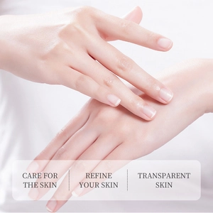 Close-up of green tea hand cream texture applied to hands for soft, hydrated skin