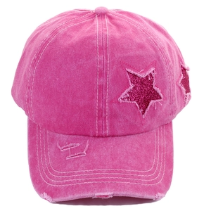 Detail of rose pink washed cotton baseball cap with sequined star and frayed edges