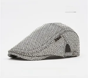 Grey straw knit ivy cap with geometric pattern and metal SEIRON brand logo detail