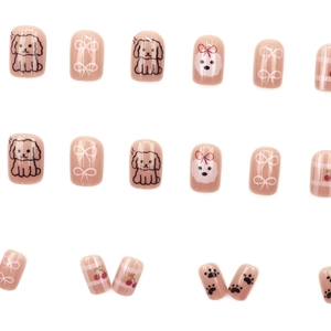 Cute cartoon dog press-on nails in nude pink with cherry and bow patterns