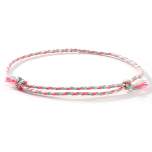 Bohemian hand-woven cotton friendship bracelet in pink and mint green with adjustable slide