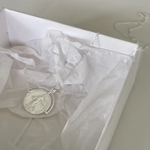 Minimalist 925 sterling silver necklace with a vintage French coin pendant in a white gift box