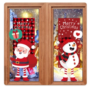 Detailed Christmas hanging flag with Santa and Snowman hanging on a wooden window