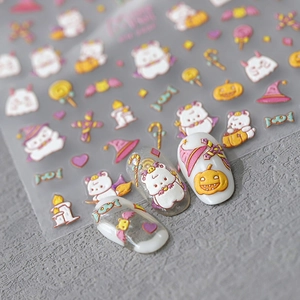 5D embossed Halloween nail art stickers with pumpkin, bear and candy designs on false nails