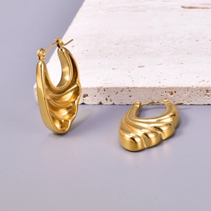 Minimalist 18K gold stainless steel hoop earrings featuring an elegant wave textured design