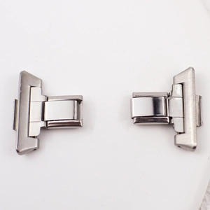 Close-up of dual silver metal watch strap connectors for smartwatches on white background