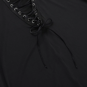 Detail of elegant black V-neckline with lace-up ribbon and silver metal eyelets