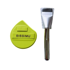 Detail of soft green teardrop sponge with brand logo and silver foundation brush