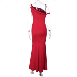 Detail of red off-shoulder fishtail maxi dress featuring a twisted knot and slim-fit cut