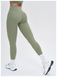 Detail view of high waisted push-up yoga leggings showing the booty lifting seam design