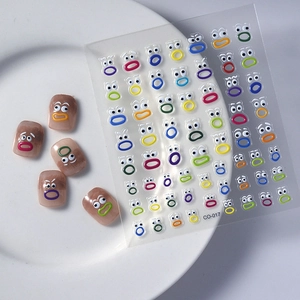 Cartoon funny face nail stickers with gold stamping on ceramic plate and nail tips