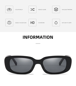 Close-up of black rectangular sunglasses with HD lenses and glare reduction icons