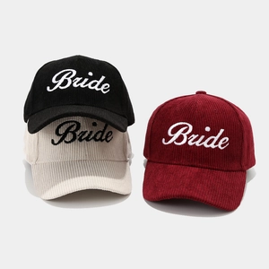 Detailed corduroy texture and white cursive Bride embroidery on baseball caps