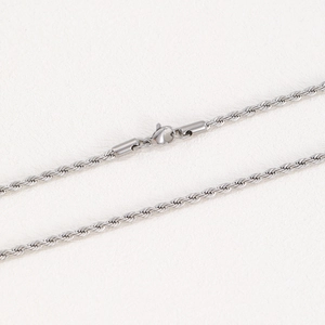 Macro detail of silver twisted rope chain with a secure lobster clasp fastener