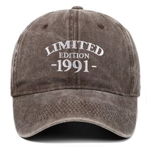 Detail of vintage washed charcoal cotton baseball cap with 1991 Limited Edition embroidery