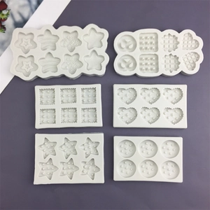 Set of 6 white silicone molds for cookies and chocolate in heart and star shapes
