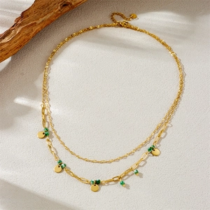 Double-layered gold-plated stainless steel necklace with green beads and round pendants