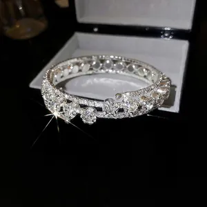 Exquisite multi-layer flower bangle with sparkling cubic zirconia in a jewelry box