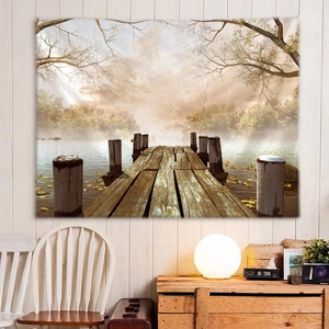 Detailed view of forest lake scenery tapestry hanging on a minimalist white wooden wall