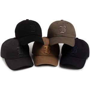 Five cotton baseball caps with Gothic B embroidery in black, grey, green, tan, and navy
