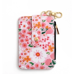 Detail of pink floral PU leather wallet with gold zipper and swivel lobster clasp