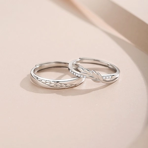 S925 sterling silver wheat ear couple rings with zircon inlays on pink background