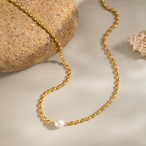 Vintage 18K gold plated titanium necklace with natural freshwater pearl on a stone
