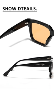 Detail view of black square sunglasses with orange lenses and silver diamond rivets